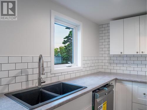 1005 95 Avenue, Dawson Creek, BC - Indoor Photo Showing Kitchen With Double Sink