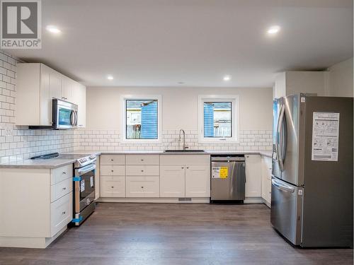 1005 95 Avenue, Dawson Creek, BC - Indoor Photo Showing Kitchen With Stainless Steel Kitchen