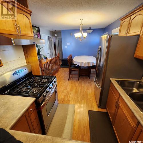 3827 Miyo-Wâhkôhtowin Road, Saskatoon, SK - Indoor Photo Showing Kitchen With Double Sink