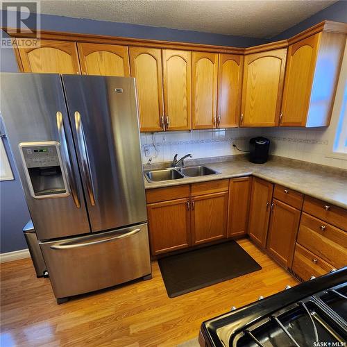 3827 Miyo-Wâhkôhtowin Road, Saskatoon, SK - Indoor Photo Showing Kitchen With Double Sink