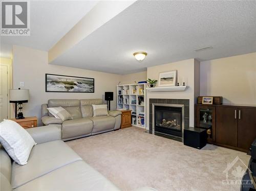 821 Percifor Way, Ottawa, ON - Indoor Photo Showing Living Room With Fireplace