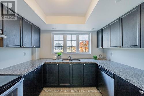 294 - 2264 Chevron Prince Path, Oshawa, ON - Indoor Photo Showing Kitchen With Double Sink