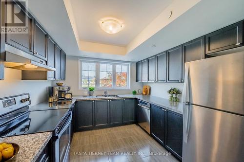 294 - 2264 Chevron Prince Path, Oshawa, ON - Indoor Photo Showing Kitchen With Stainless Steel Kitchen With Double Sink