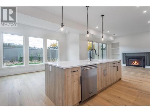 Plenty of space for your entertaining needs - 907 Bull Crescent Lot# 91, Kelowna, BC - Indoor Photo Showing Kitchen With Upgraded Kitchen