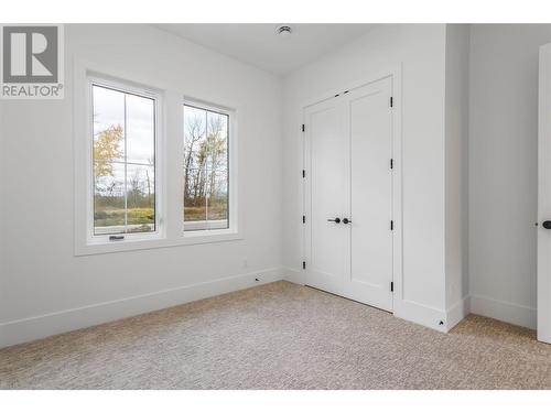 Another view of Bedroom One - 907 Bull Crescent Lot# 91, Kelowna, BC - Indoor Photo Showing Other Room