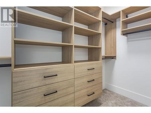 Your custom walk-in closet for the Primary Suite - 907 Bull Crescent Lot# 91, Kelowna, BC - Indoor With Storage