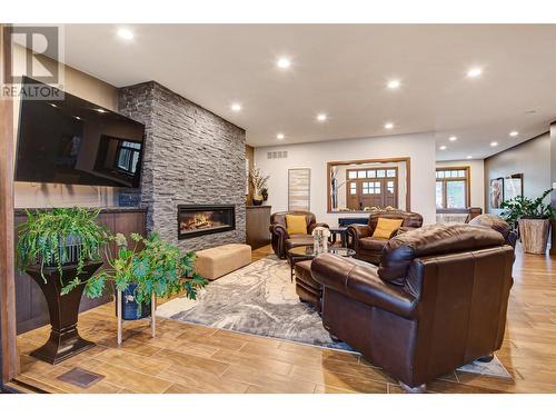 616 Hart Place, Vernon, BC - Indoor Photo Showing Other Room With Fireplace