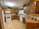 19 Good Spirit Crescent, Yorkton, SK  - Indoor Photo Showing Kitchen With Double Sink 