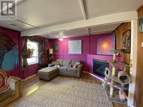 6887 16Th Street, Grand Forks, BC - Indoor Photo Showing Living Room With Fireplace