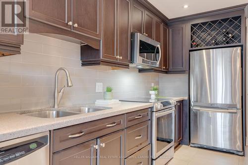 36 - 2355 Fifth Line W, Mississauga, ON - Indoor Photo Showing Kitchen With Stainless Steel Kitchen With Double Sink With Upgraded Kitchen