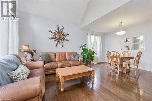 Living room featuring hardwood / wood-style flooring and vaulted ceiling - 43 Marr Drive, Elora, ON - Indoor Photo Showing Living Room