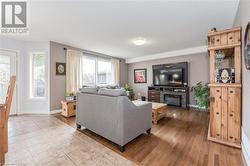 Living room featuring wood-type flooring - 