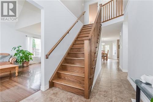 Stairs with high vaulted ceiling and hardwood / wood-style flooring - 43 Marr Drive, Elora, ON - Indoor Photo Showing Other Room