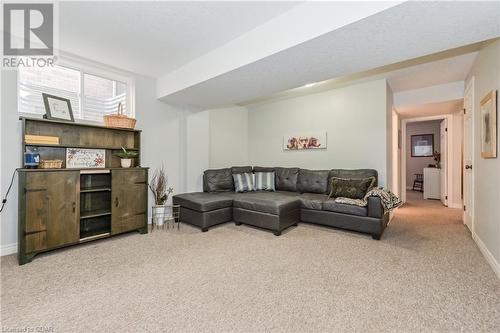 Living room with carpet - 43 Marr Drive, Elora, ON - Indoor