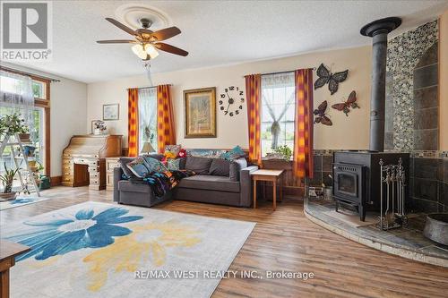 785 Scugog Line 12, Scugog, ON - Indoor Photo Showing Living Room With Fireplace