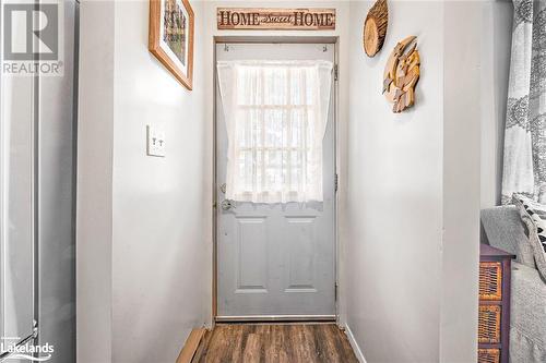 Doorway featuring dark wood-type flooring - 97 William Street, Parry Sound, ON - Indoor Photo Showing Other Room