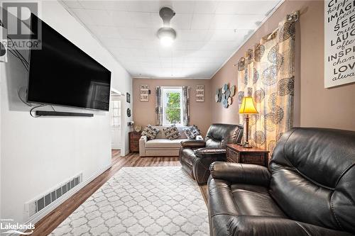 Living room with wood-type flooring - 97 William Street, Parry Sound, ON - Indoor Photo Showing Living Room