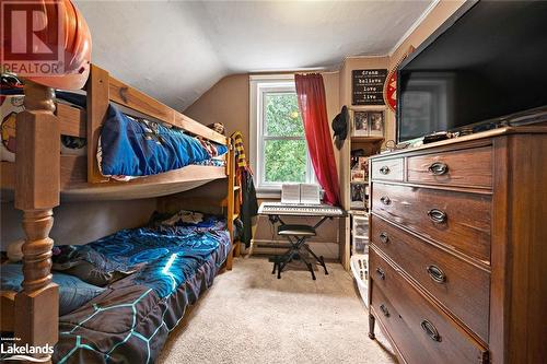 Carpeted bedroom with vaulted ceiling - 97 William Street, Parry Sound, ON - Indoor Photo Showing Bedroom