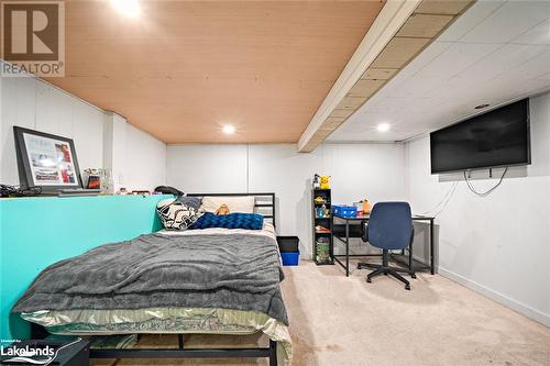 Carpeted bedroom with beam ceiling - 97 William Street, Parry Sound, ON - Indoor Photo Showing Bedroom