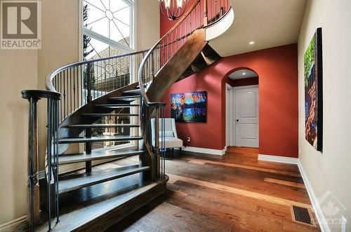 Sweeping stair case - 5844 Longhearth Way, Manotick, ON - Indoor Photo Showing Other Room