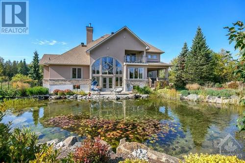 An unbeatable setting - 5844 Longhearth Way, Manotick, ON - Outdoor With Body Of Water