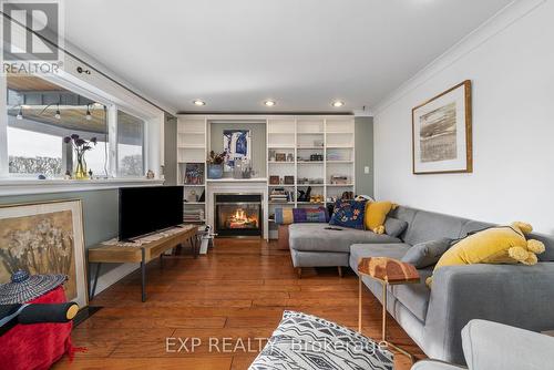 295 Main Street, Prince Edward County (Bloomfield), ON - Indoor Photo Showing Living Room With Fireplace