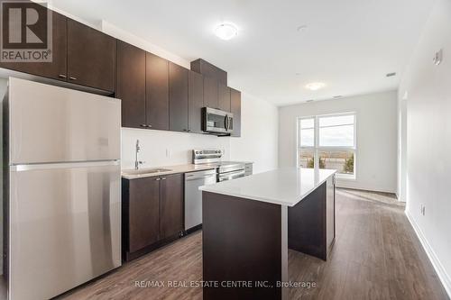 107 - 490 Gordon Krantz Avenue, Milton, ON - Indoor Photo Showing Kitchen With Upgraded Kitchen