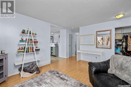 29 Kemp Crescent, Prince Albert, SK - Indoor Photo Showing Living Room With Fireplace