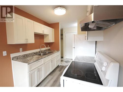 110 Skaha Place Unit# 303, Penticton, BC - Indoor Photo Showing Kitchen With Double Sink