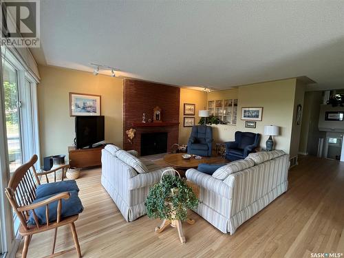 604 North Hill Drive, Swift Current, SK - Indoor Photo Showing Living Room With Fireplace