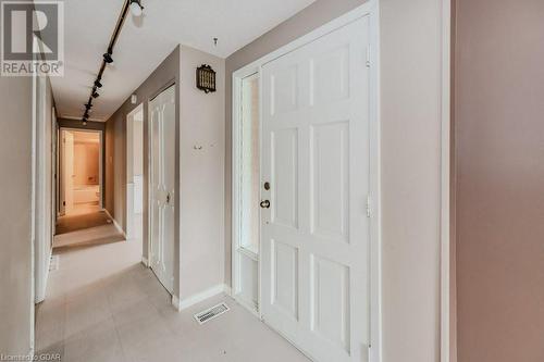 Corridor featuring rail lighting - 46 Appalachian Crescent, Kitchener, ON - Indoor Photo Showing Other Room