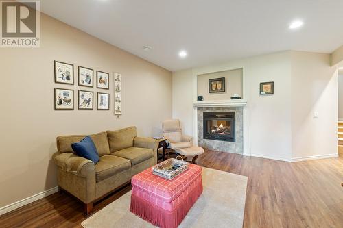 4141 Gallaghers Boulevard S, Kelowna, BC - Indoor Photo Showing Living Room With Fireplace