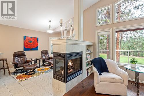 4141 Gallaghers Boulevard S, Kelowna, BC - Indoor Photo Showing Living Room With Fireplace