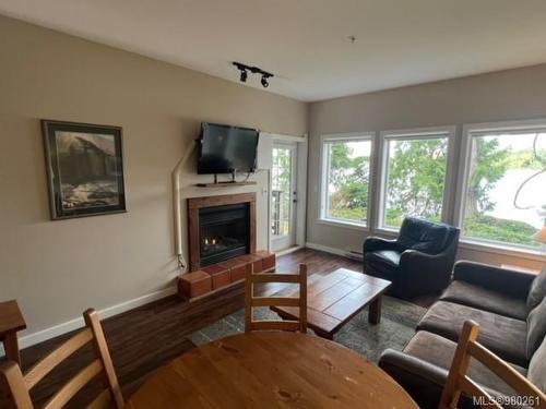 602-1971 Harbour Dr, Ucluelet, BC - Indoor Photo Showing Living Room With Fireplace