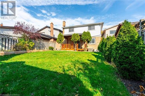 Back of house with cooling unit and a yard - 46 Mark Place, Hamilton, ON 