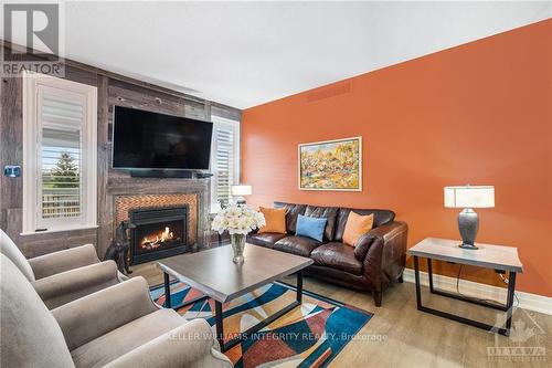 106 Blackhorse Drive, North Grenville, ON - Indoor Photo Showing Living Room With Fireplace