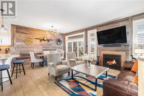 106 Blackhorse Drive, North Grenville, ON - Indoor Photo Showing Living Room With Fireplace