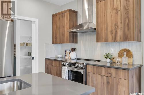 907 Traeger Manor, Saskatoon, SK - Indoor Photo Showing Kitchen With Upgraded Kitchen