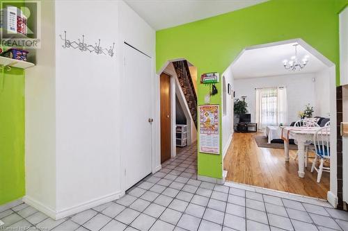 Recreation room with a chandelier and light wood-type flooring - 63 Clyde Street, Hamilton, ON - Indoor Photo Showing Other Room