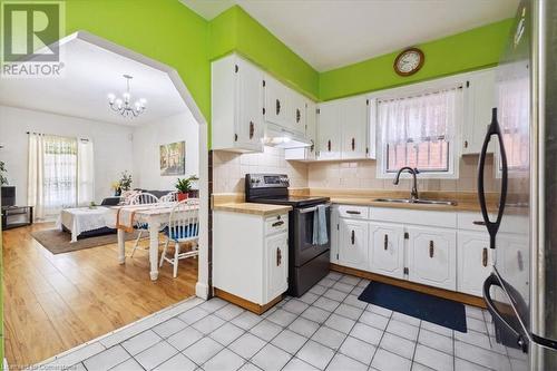 63 Clyde Street, Hamilton, ON - Indoor Photo Showing Kitchen With Double Sink