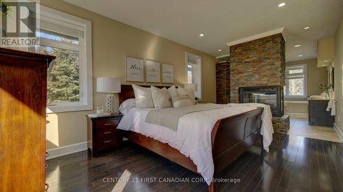 1659 Hamilton Road, London, ON - Indoor Photo Showing Bedroom With Fireplace