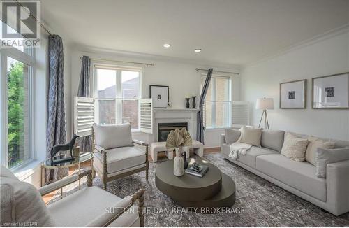 7156 Clayton Court, London, ON - Indoor Photo Showing Living Room With Fireplace