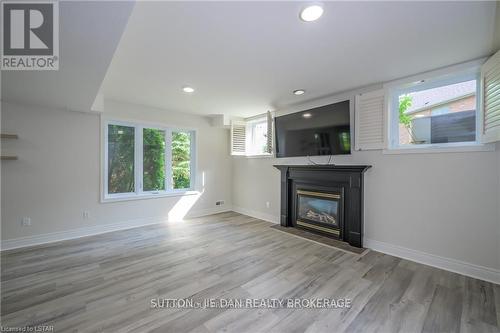 7156 Clayton Court, London, ON - Indoor Photo Showing Living Room With Fireplace