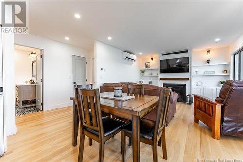 490 Glebe Road, Chamcook, NB - Indoor Photo Showing Dining Room With Fireplace