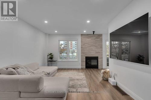 24 - 1098 King Street W, Kingston (Central City West), ON - Indoor Photo Showing Living Room With Fireplace