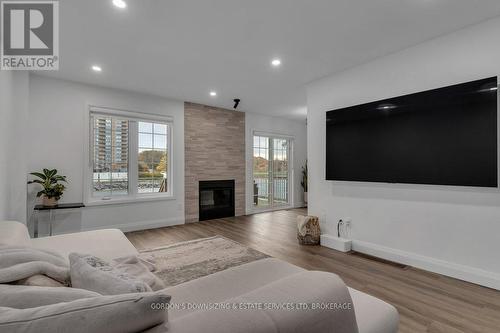 24 - 1098 King Street W, Kingston (Central City West), ON - Indoor Photo Showing Living Room With Fireplace