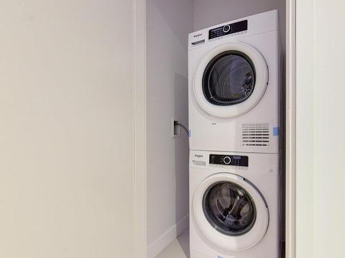 Salle de lavage - 3411-1205 Place Phillips, Montréal (Ville-Marie), QC - Indoor Photo Showing Laundry Room