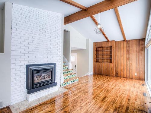 Salle Ã  manger - 12 Crois. Wood, Beaconsfield, QC - Indoor Photo Showing Living Room With Fireplace