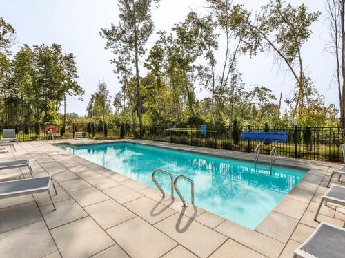 Pool - 1020-7001 Rue Prudent-Beaudry, Mascouche, QC - Outdoor With In Ground Pool With Backyard