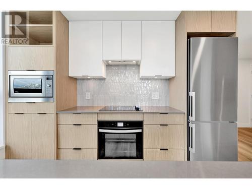 Quality fixtures and finishes. - 1488 Bertram Street Unit# 3206 Lot# 250, Kelowna, BC - Indoor Photo Showing Kitchen